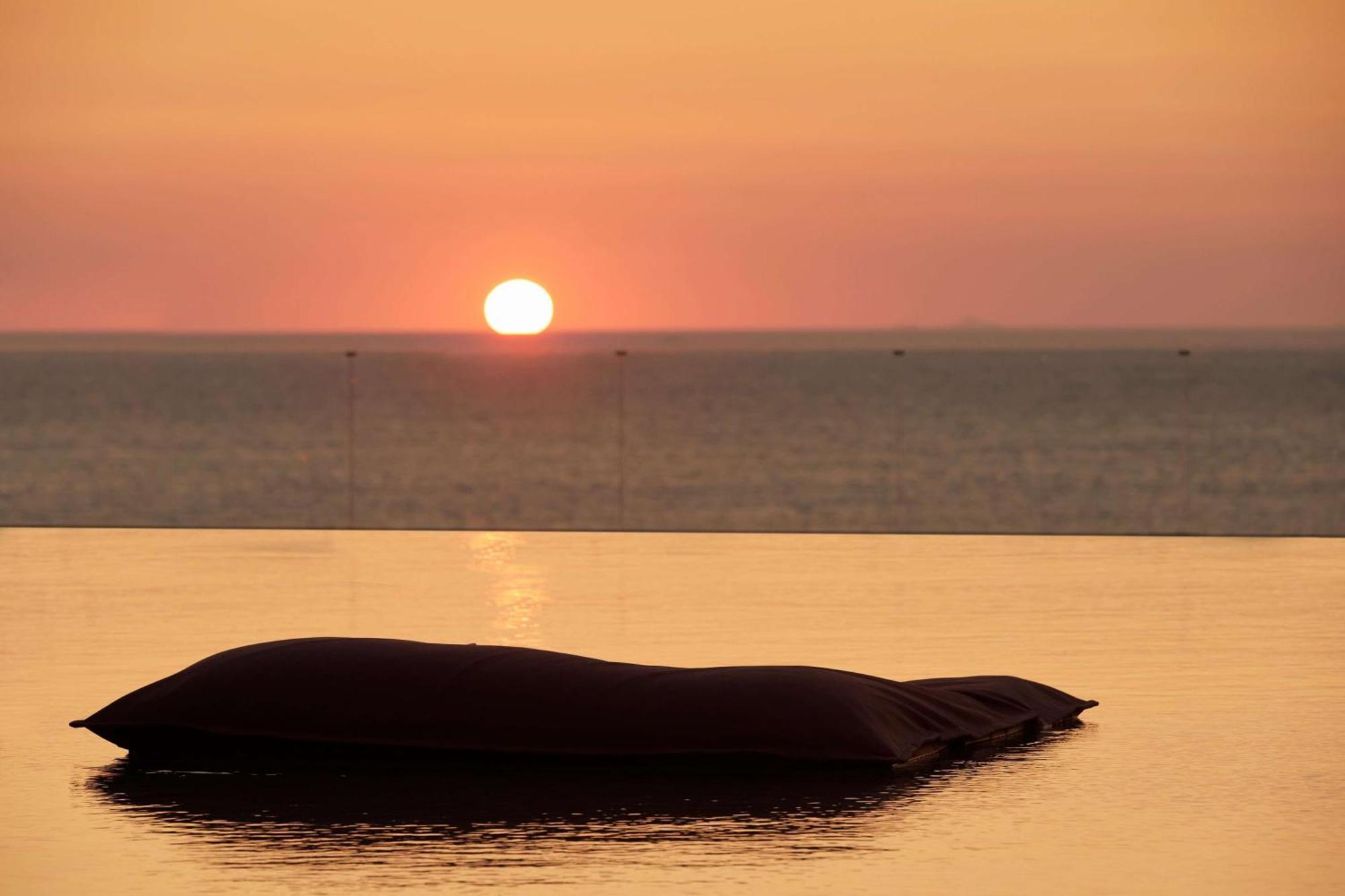 Minos Palace Resort - Adults Only Agios Nikolaos  Bagian luar foto Sunset at the beach