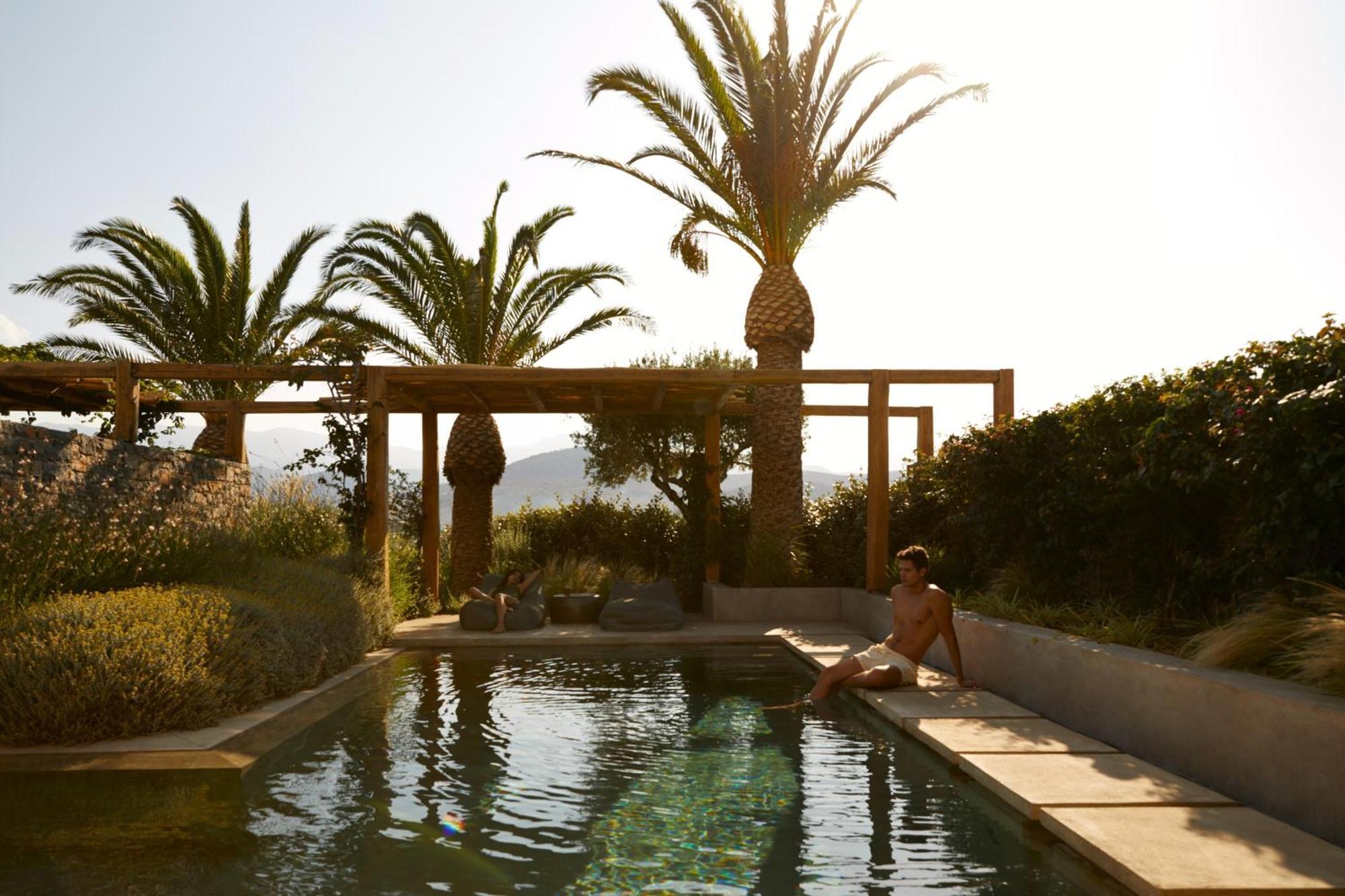 Minos Palace Resort - Adults Only Agios Nikolaos  Bagian luar foto The pool at the Aman Resort in Crete