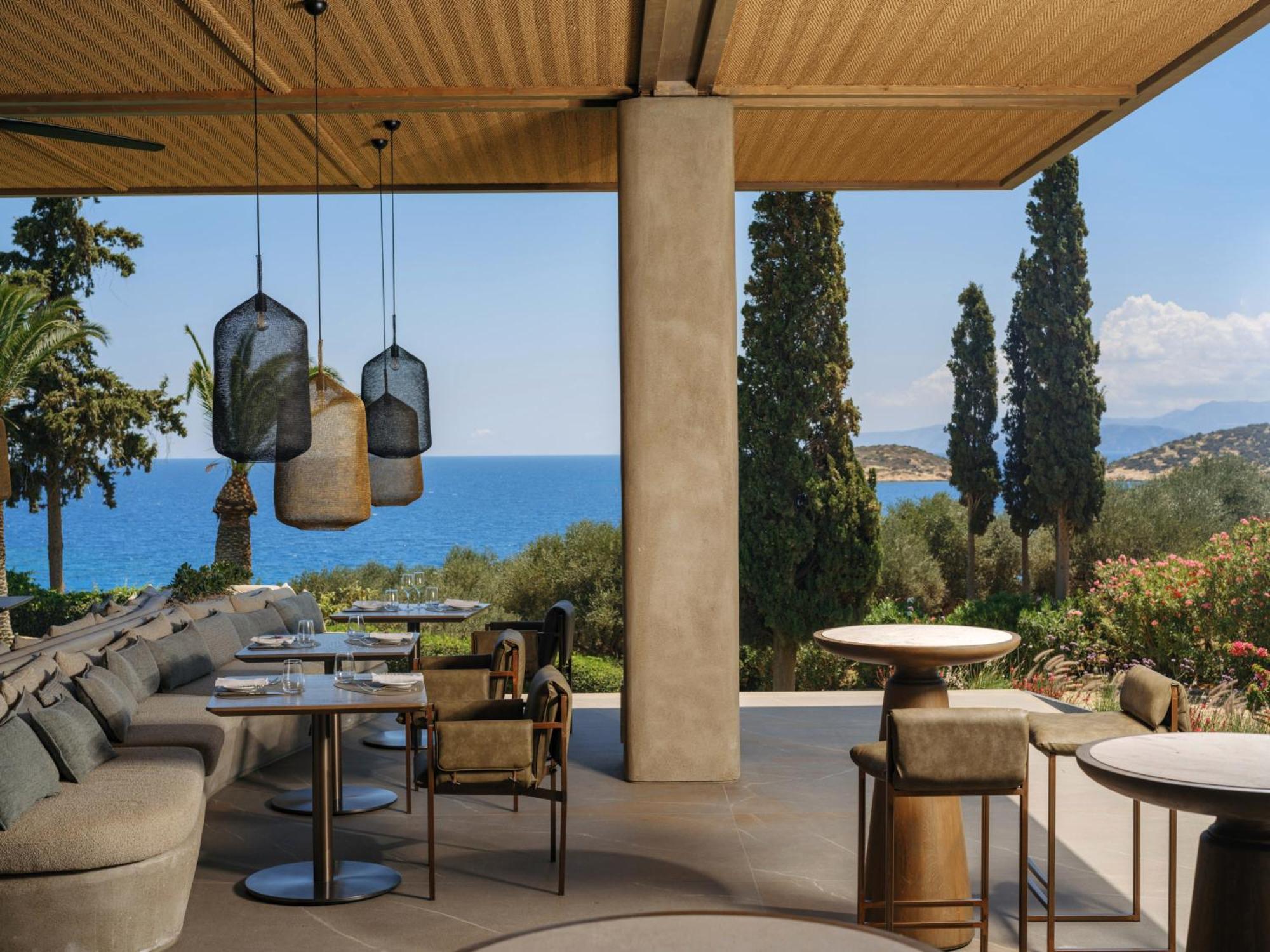 Minos Palace Resort - Adults Only Agios Nikolaos  Bagian luar foto The restaurant at the hotel